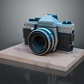 Vintage PRAKTICA Film Camera With Classic Lens On Wooden Display Base