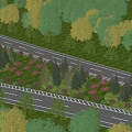 Municipal Road Lined with Lush Green Trees and Vibrant Flower Beds on Both Sides