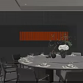 Private Dining Room With Round Table Dark Wood Walls Red Accent And Flower Arrangement