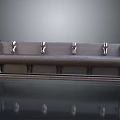 Dark Wooden Hook Rack With Four Metal Hooks And Decorative Edges On Smooth Surface