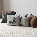 Decorative Throw Pillows with Textured Circular Pattern Striped and Solid Colors on White Woven Rug 3d model