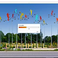 Colorful Human Figure Sculptures on Tall Poles with Background Trees in DASHANHILL International Park