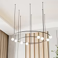 Modern Minimalist Circular Chandelier With Black Metal Frame And White Globe Bulbs In Interior Space