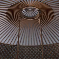 Traditional Dome Shaped Yurt Tent With Beige Fabric Colorful Embroidery Wooden Doors And Floor
