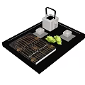 Elegant Tea Set with White Teapot Containers on Black Tray Gold Patterned Book Green Leaves