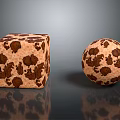 Textured Cube And Sphere With Brown Spots On Light Brown Surface