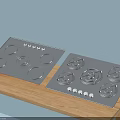 Modern Kitchen Appliances Including Electric Cooktop And Gas Hob On Wooden Countertop