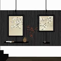 Abstract Paintings in Golden Frames on Dark Wooden Wall with Shelf Featuring Pottery Red Branches
