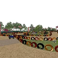 Fun Playground Featuring Colorful Tire Obstacles Sand Ground GO Sign And City Skyline