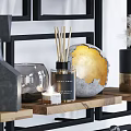 Modern Geometric Frame Bookcase With Decorative Coral Vases Glass Jars Baskets And Plants