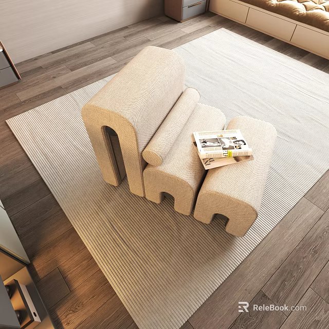 Beige Accent Chair with Modular Design on Light Colored Rug and Magazine on Wooden Floor 3d model 