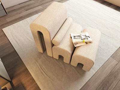 Beige Accent Chair with Modular Design on Light Colored Rug and Magazine on Wooden Floor 3d model