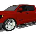 Red Toyota Tundra Pickup Truck With Stylish Exterior And Large Alloy Wheels