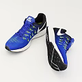 Nike Blue Sports Shoes With White Logo Green Details And Treaded Soles