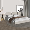 Modern Double Bed Bedroom Interior With Upholstered Headboard Artwork Pendant Lights And Wooden Floor