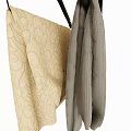 Black Hangers Hanging on Metal Rod with Beige and Gray Clothes