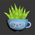 Green Leafy Plant In Blue Cup Shaped Pot With Glasses And Smiley Decoration