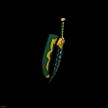 Decorative Green And Gold Curved Ornament With Snake Pattern And Intricate Handle Design