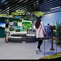 Cultural Center Interior With Visitors Exploring Exhibition Murals Digital Screens And Decorative Flags