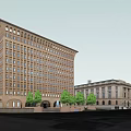 Tall Classical Office Building With Multiple Windows Adjacent Low Rise And Trees