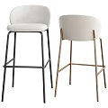 Modern Minimalist Bar Stools With Black And Gold Metal Frames And Light Upholstered Seats