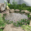 Natural Water Fountain with Rocks Koi Fish and Green Plants in Garden