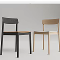Two Modern Dining Chairs In Black And Light Wood With Simple Backrest Design