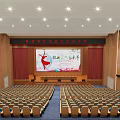 Spacious Conference Room Auditorium Style With Blue Seats Wooden Walls And Ceiling Lights