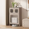 Modern Storage Cabinet with Glass Doors and Gold Handles Holding Vase with Flowers and White Appliance