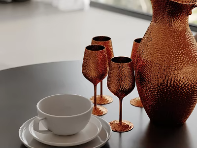 Hammered Copper Pitcher And Four Goblets With White Cup On Black Table 3d model