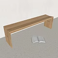 Sleek Light Wooden Bench With Open Book In Minimalist Interior Design