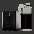 Canon Vintage Camera With Silver Black Body And Lens On Reflective Surface
