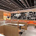 Modern Shopping Mall Restaurant With Orange Counter Wooden Elements Tables Chairs And Green Plants
