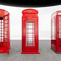 Three Iconic Red Telephone Booths Classic Public Facility with Glass Panels