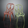 Modern Curved Red and Green Chairs With Artistic Design and Smooth Lines