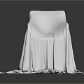 White Textured Cloth Covered Chair With Draped Fabric On Dark Surface