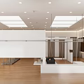 Modern Clothing Store Interior With Display Racks And Fashion Apparel Sections
