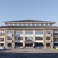Traditional Roof Modern Glass Facade Multi Storey Office Building With Open Plaza And Blue Sky