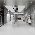 Modern Clothing Store Interior Design With Hanging Clothes Reception Desk And Sofa Area
