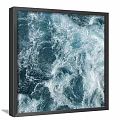 Two Framed Blue Ocean Wave Artworks Hung On Gray Wall