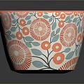 Colorful Ceramic Mug with Orange Interior Blue Handle and Red Floral Green Leaf Patterns
