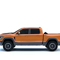 Orange Dodge RAM Pickup Truck With Black Hood Side Steps And Large Off-Road Tires