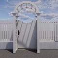 White Arched Entrance Gate With Picket Fence And Stone Paved Pathway