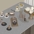 Elegant Afternoon Tea Setup with Coffee Cups Teapot and Pastries on White Countertop