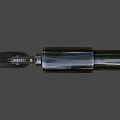 Detailed View Of Black Revolver Handgun With Metal Barrel And Rubber Grip