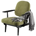 Brown Leather Armchair With Wooden Arms And Gray Throw Blanket