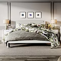 Double Bed Interior With Three Framed Paintings Bedside Tables Lamps Floral Quilt And Gray Blanket