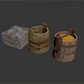 Rope Bound Wooden Barrels And Open Box With Yellow Liquid Inside