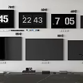 Wall Mounted Televisions With 70 46 65 80 Inch Screens And Digital Clocks Showing Time