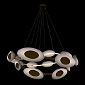 Sleek Modern Metallic Chandelier With Multiple Circular Light Rings Hanging in Interior